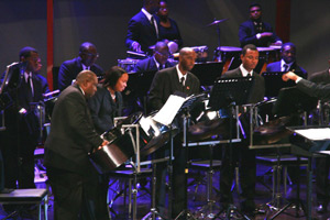 National music: Members of the National Steel Symphony Orchestra during Saturday night's performance at the National Academy for the Performing Arts (NAPA) in Port of Spain