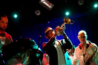 Etienne Charles, center, joined by steelpan player Victor Provost, left, and Jacques Schwartz-Bart, celebrating a recording release at Le Poisson Rouge