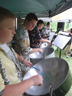 The sounds of the islands waft throughout the Foothills Arts Council garden thanks to the student performers in the Pandemic Steel Drum Band out of Hickory. The band will be making its third appearance at KidsFest this year on July 13.