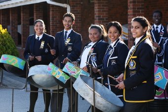 Westering High School Steel band members, from left, Jody Koesnel, 18, Bulelwa Pikinini, 17, and Yeshria Pillay, 18, tune up for the KFC Herald Country Fair on August 25.
